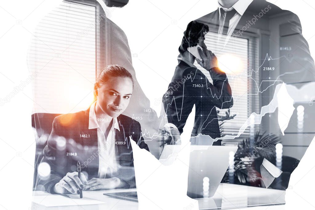 Businessman and businesswoman wearing formal suits work together talking on smartphone and using laptop and shaking hands. Office workplace in the background. Concept of teamwork and cooperation