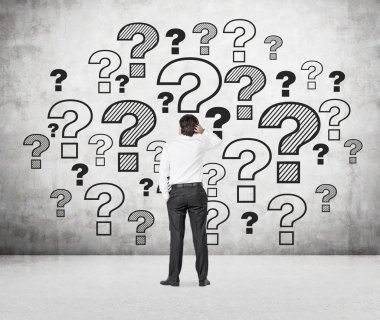 soru işaretleri arıyor işadamı