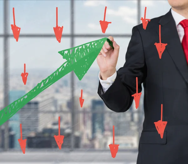 Businessman drawing green graph — Stock Photo, Image