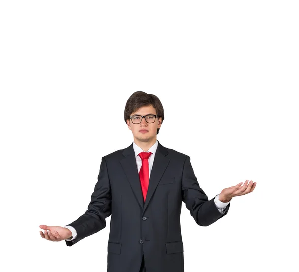 Businessman holding invisible objects — Stock Photo, Image