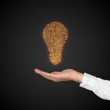 sarı ampul tutan el