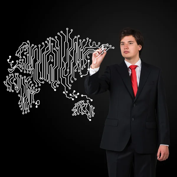 Businessman  drawing microcircuit — Stock Photo, Image