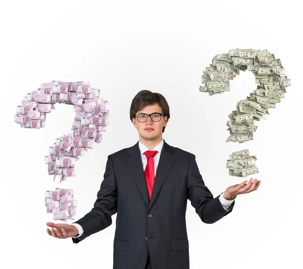 Businessman holding money question mark — Stock Photo, Image