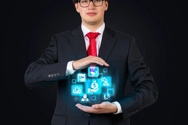 Businessman holding business interface — Stock Photo, Image