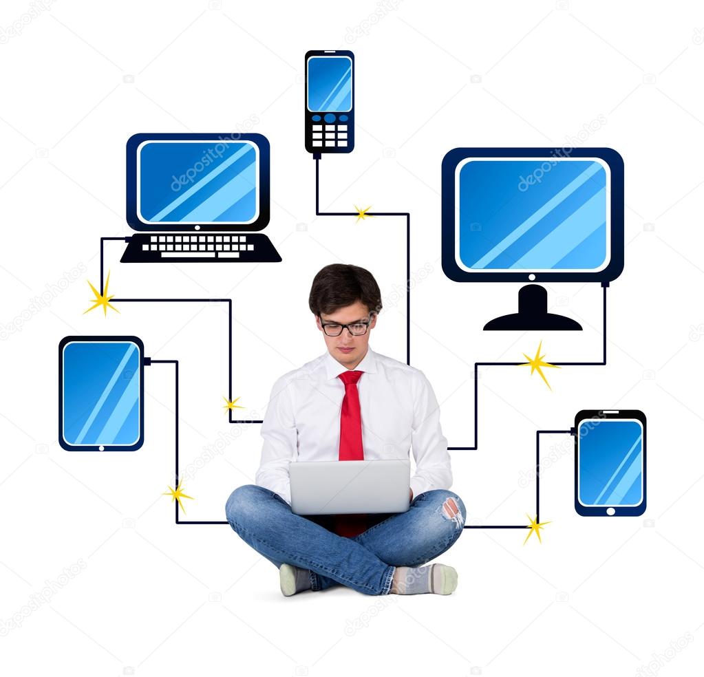 businessman connected to gadgets