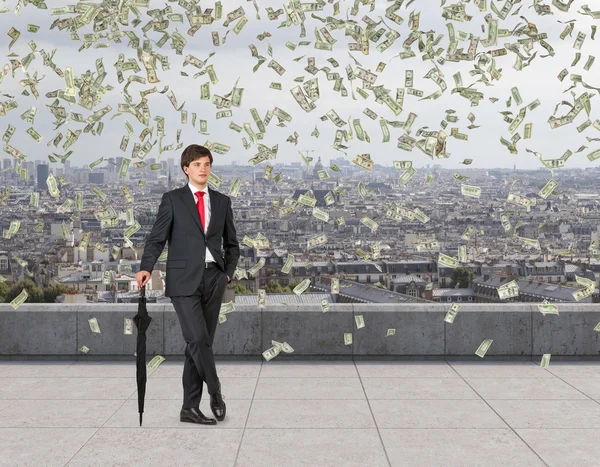 Businessman on roof — Stock Photo, Image