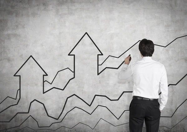 Affärsman ritade diagram och pilen — Stockfoto