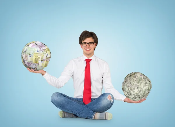 Man holding ball of money — Stock Photo, Image