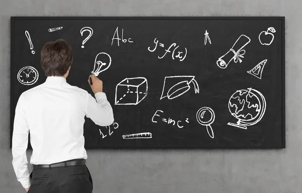 Onderwijs symbool op blackboard — Stockfoto
