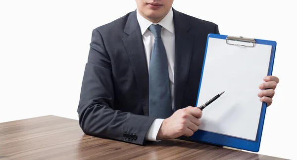 Businessman holding blank clipboard — Stock Photo, Image