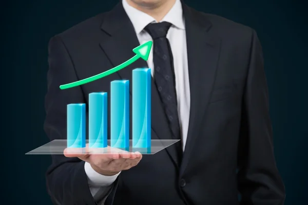 Businessman holding stock graph — Stock Photo, Image