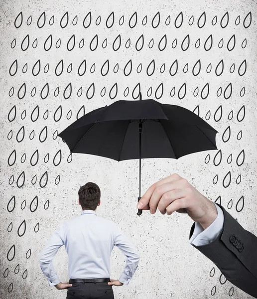 Businessman with umbrella — Stock Photo, Image