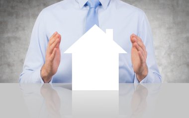 holding kağıt ev iş adamı