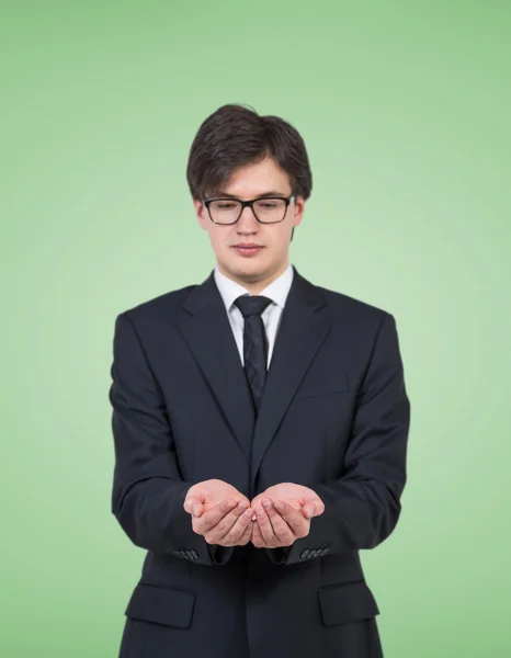 Geschäftsmann mit unsichtbarem Gegenstand — Stockfoto