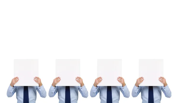 Quatro empresário segurando cartaz em branco — Fotografia de Stock