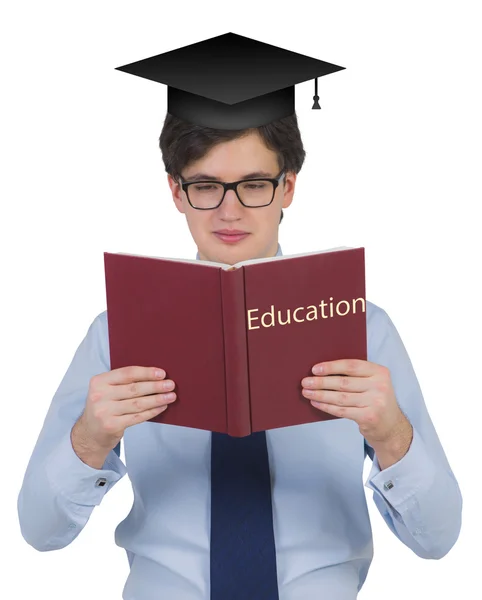 Businessman holding livre — Photo