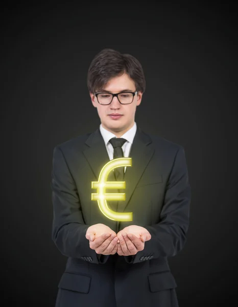 Pengusaha memegang euro — Stok Foto