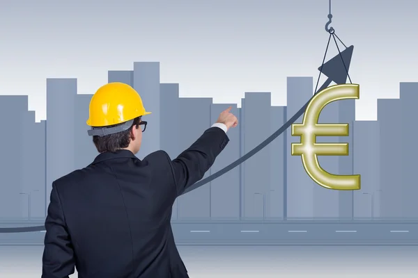 Uomo d'affari punta all'euro — Foto Stock