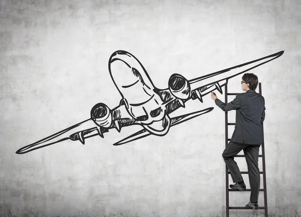 Hombre de negocios dibujo avión — Foto de Stock