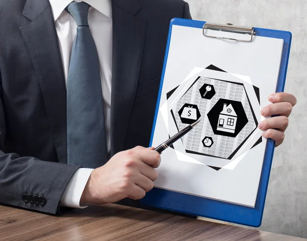 Clipboard with real estate concept — Stock Photo, Image