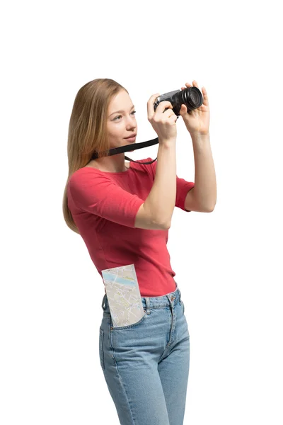 Tourist young woman is taking a picture. Isolated. — Stock Photo, Image