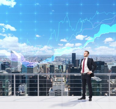 Trader on the roof in New York city. Forex chart over the sky. A concept of prosperous portfolio management process.