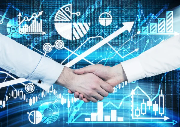 Handshake over the digital screen with charts and graphs. A concept of capital market transactions. — Stock Photo, Image