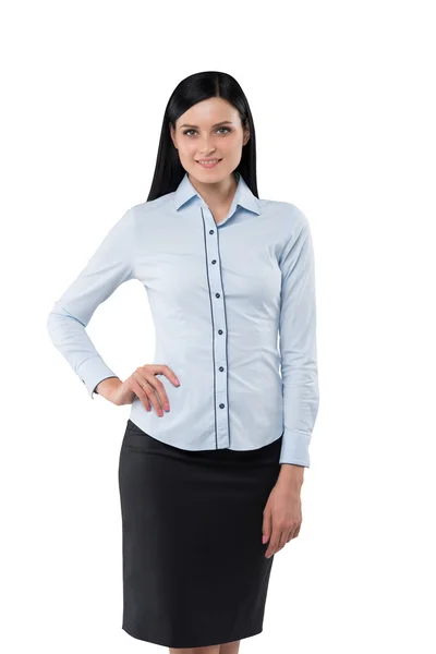 Brünettes Mädchen im formellen Hemd hält eine Hand auf der Taille. — Stockfoto