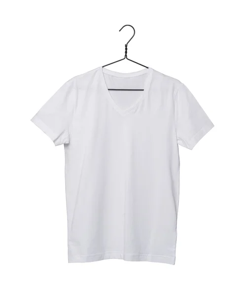 Close-up of the white t-shirt on the clothes hanger. Isolated on white background. — Stock Photo, Image