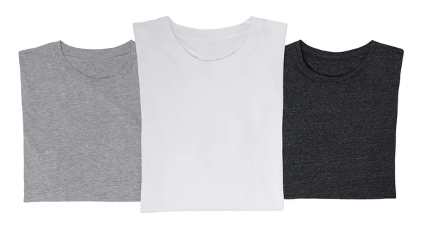 Close-up van de drie t-shirts (zwart, wit en grijs). geïsoleerd. — Stockfoto