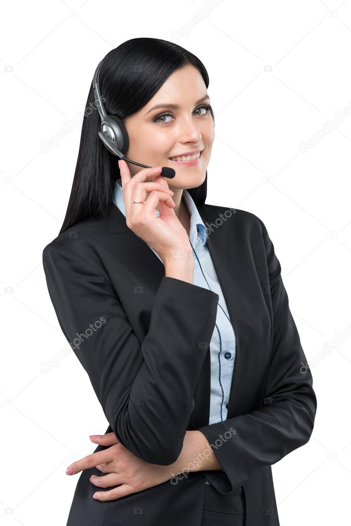 Portrait of brunette support phone operator with the headset. Isolated on white background