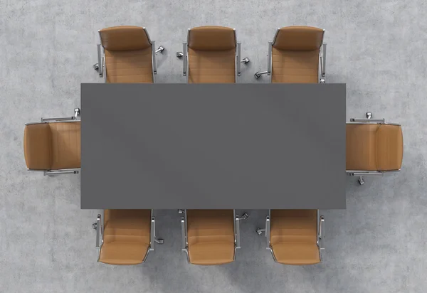Top view of a conference room. A dark grey rectangular table and eight brown leather chairs around. 3D interior. — Stock Photo, Image