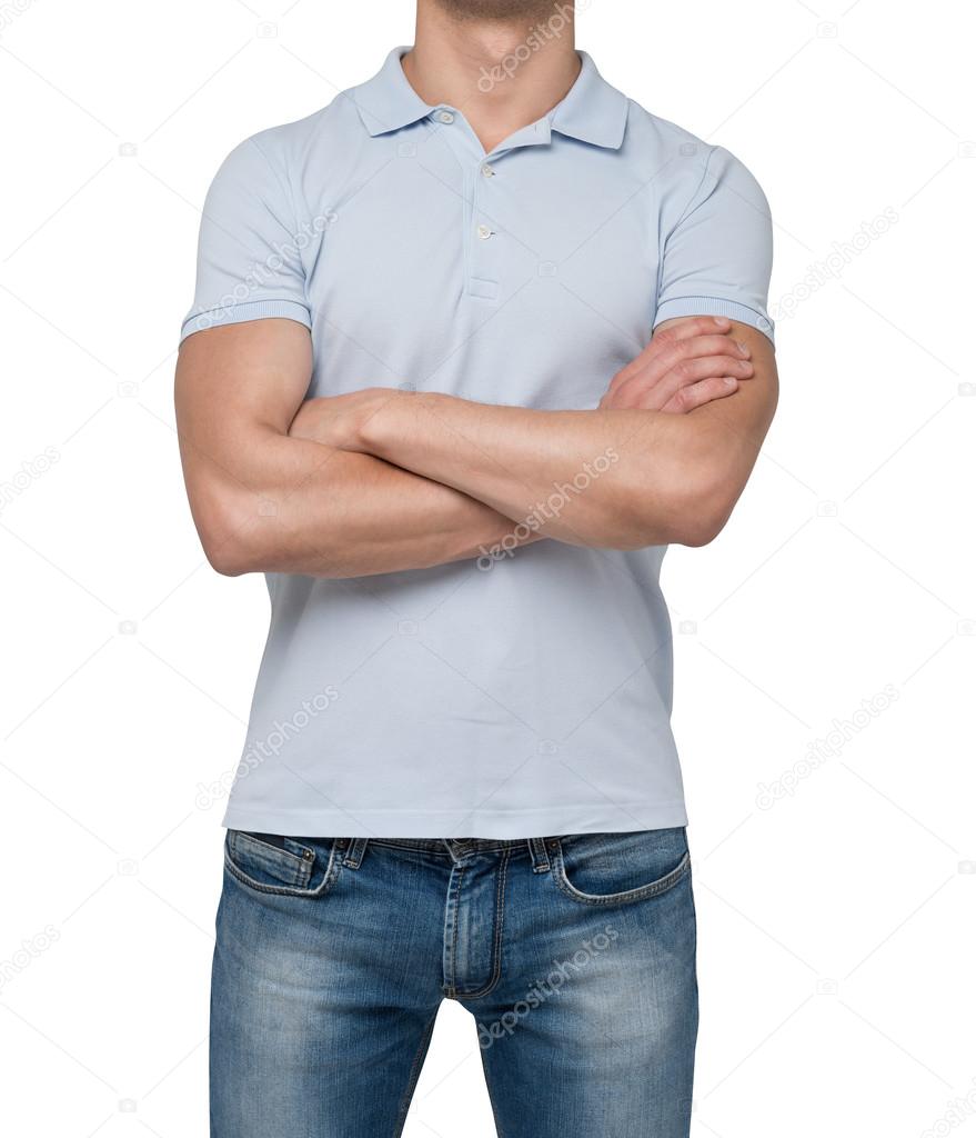 Front view of a person in a blue polo t-shirt with crossed hands. isolated.