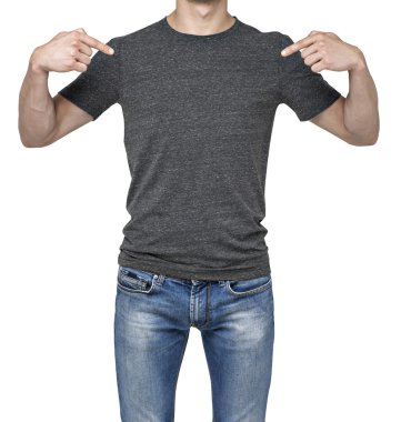 Close-up of a man pointing his fingers on a blank grey t-shirt. Isolated.