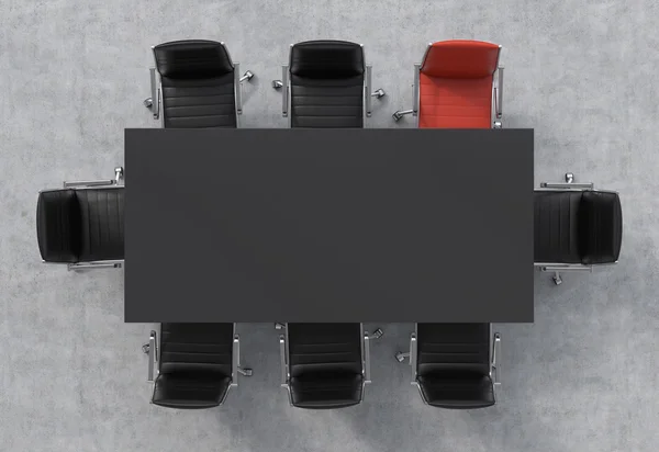 Top view of a conference room. A black rectangular table and eight chairs around, one of them is red. Office interior. 3D rendering. — Stock Photo, Image