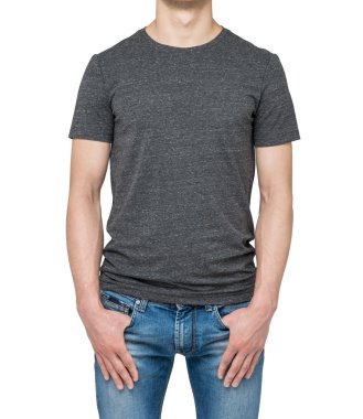 Close-up of a man in a blank grey t-shirt. Hands in the denims pockets. Isolated.