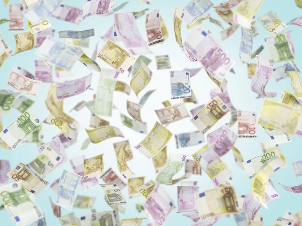 Voando EURO notas sobre fundo azul . — Fotografia de Stock