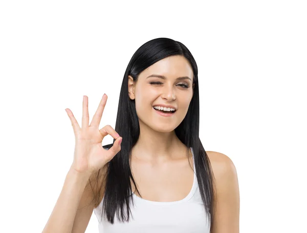 Brunette woman shows ok sign. Isolated. — 스톡 사진