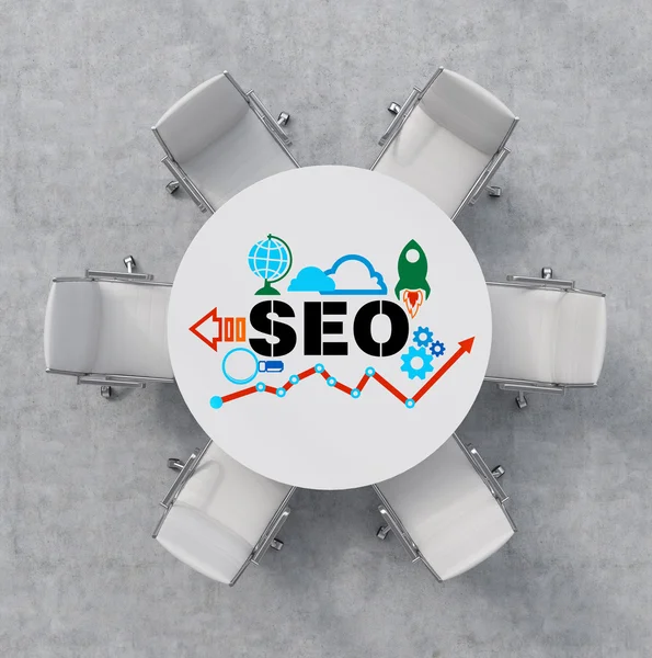 Top View of a conference room. A white round table and six white chairs around. Colourful SEO flowchart is drawn on the table surface. Office interior. 3D rendering. — Stock Photo, Image
