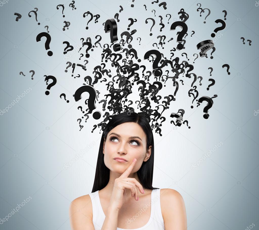 A portrait of a beautiful brunette with questioning expression and question marks above her head.