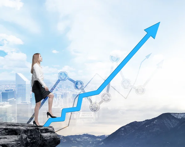 Full length beautiful woman in formal clothes on the rock is going up along the growing arrow. Financial charts and New York panoramic view on the background. — Stock Photo, Image