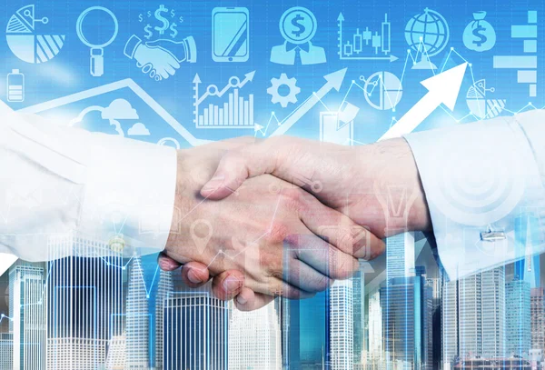 A handshake is over the growing arrow and business icons in blur on the background. — Stock Photo, Image