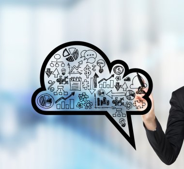 A woman's hand is drawing a cloud with business icons on the glass screen. A concept of business presentation. clipart