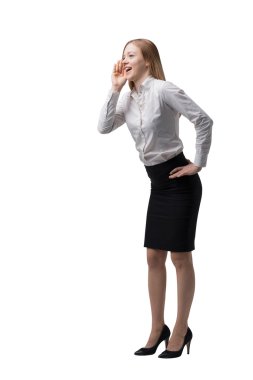 Full length side view of the business lady in formal clothes is trying to draw the attention to something. Isolated.