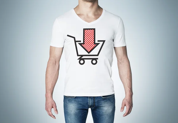 Close-up of a man in a white t-shirt with a sketch of the red down arrow and the basket. A concept of the decreasing of the purchasing power. — 스톡 사진