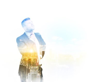 A transparent silhouette of a businessman. New York cityscape on the background.