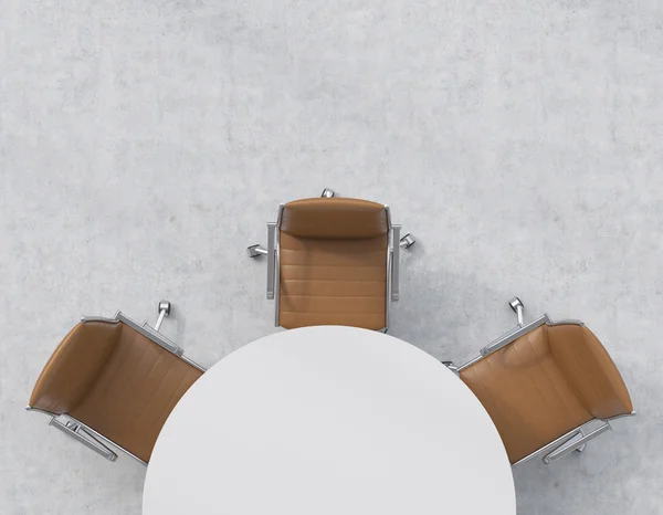 Top view of a half of the conference room. A white round table, three brown leather chairs. Office interior. 3D rendering. — Stock Fotó