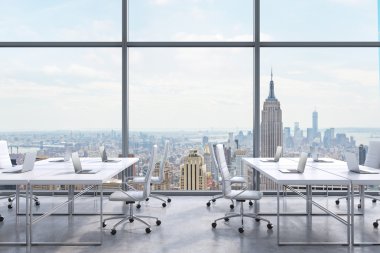 Workplaces in a modern panoramic office, New York city view from the windows. A concept of financial consulting services. 3D rendering. clipart