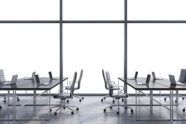 Workplaces in a modern panoramic office, copy space in the windows. Open space. Black tables and black leather chairs. A concept of financial consulting services. 3D rendering.