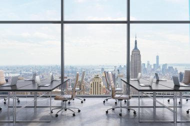Workplaces in a modern panoramic office, New York city view from the windows. Open space. Black tables and brown leather chairs. A concept of financial consulting services. 3D rendering.